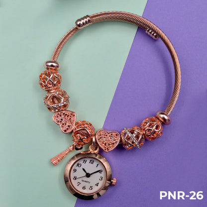 PNR  RELOJ PULSERA TIPO PANDORA DORADO