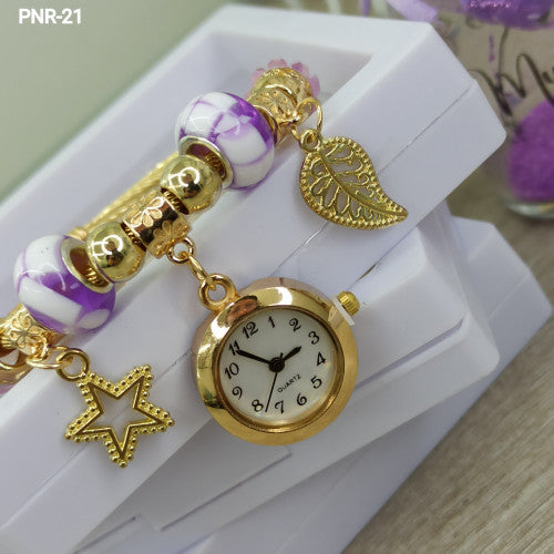 PNR  RELOJ PULSERA TIPO PANDORA DORADO